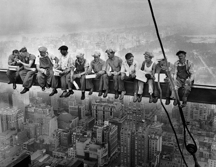 workers on a beam